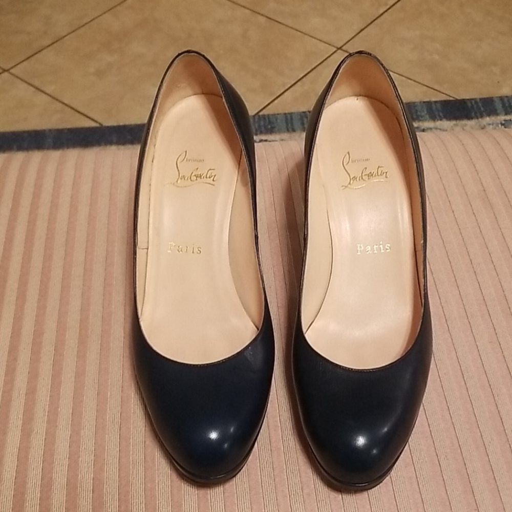 Authentic Christian Louboutin heels resoled